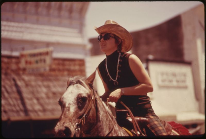 Horsewoman Parades Down the Main Street of Cottonwood Falls, Kansas, near Emporia, During the Festivities for the Flint Hills Rodeo, an Annual Major Cultural Event of the Area...06/1974