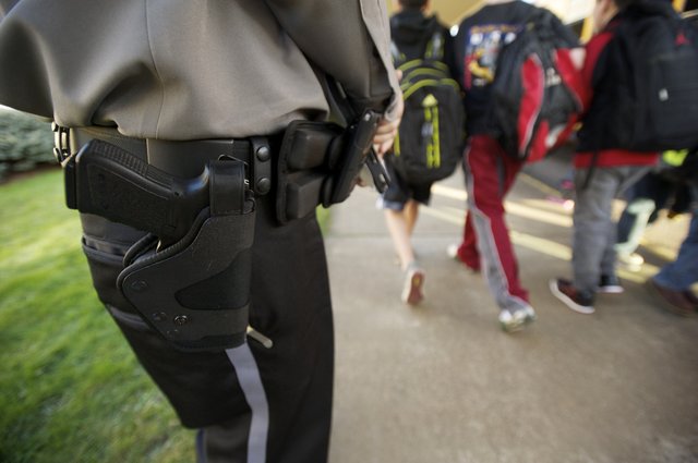 Armed Guard Disarms School Shooter « DarkGovernment