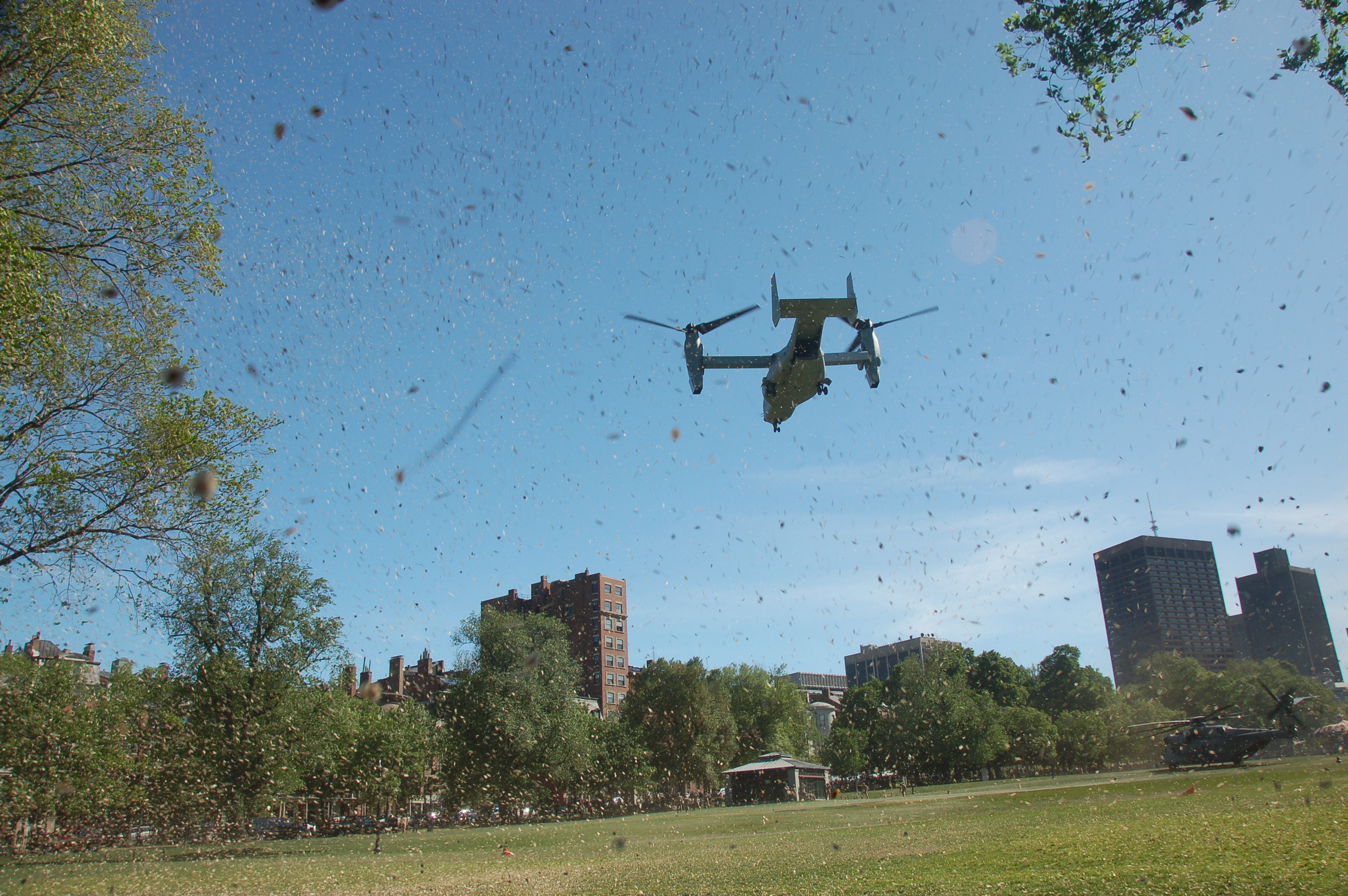 Marine Week Boston, 2010: Bell-Boeing MV-22B Osprey tilt-rotor aircraft taking off from Boston Common (note all the debris it kicked into the air!)