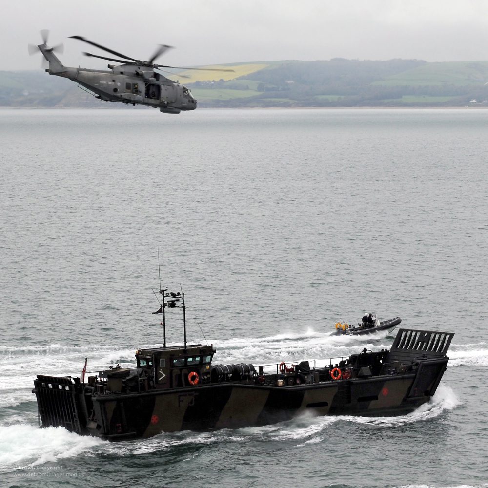 Royal Navy Merlin Helicopter with Royal Marines Landing Craft During Olympics Security Exercise