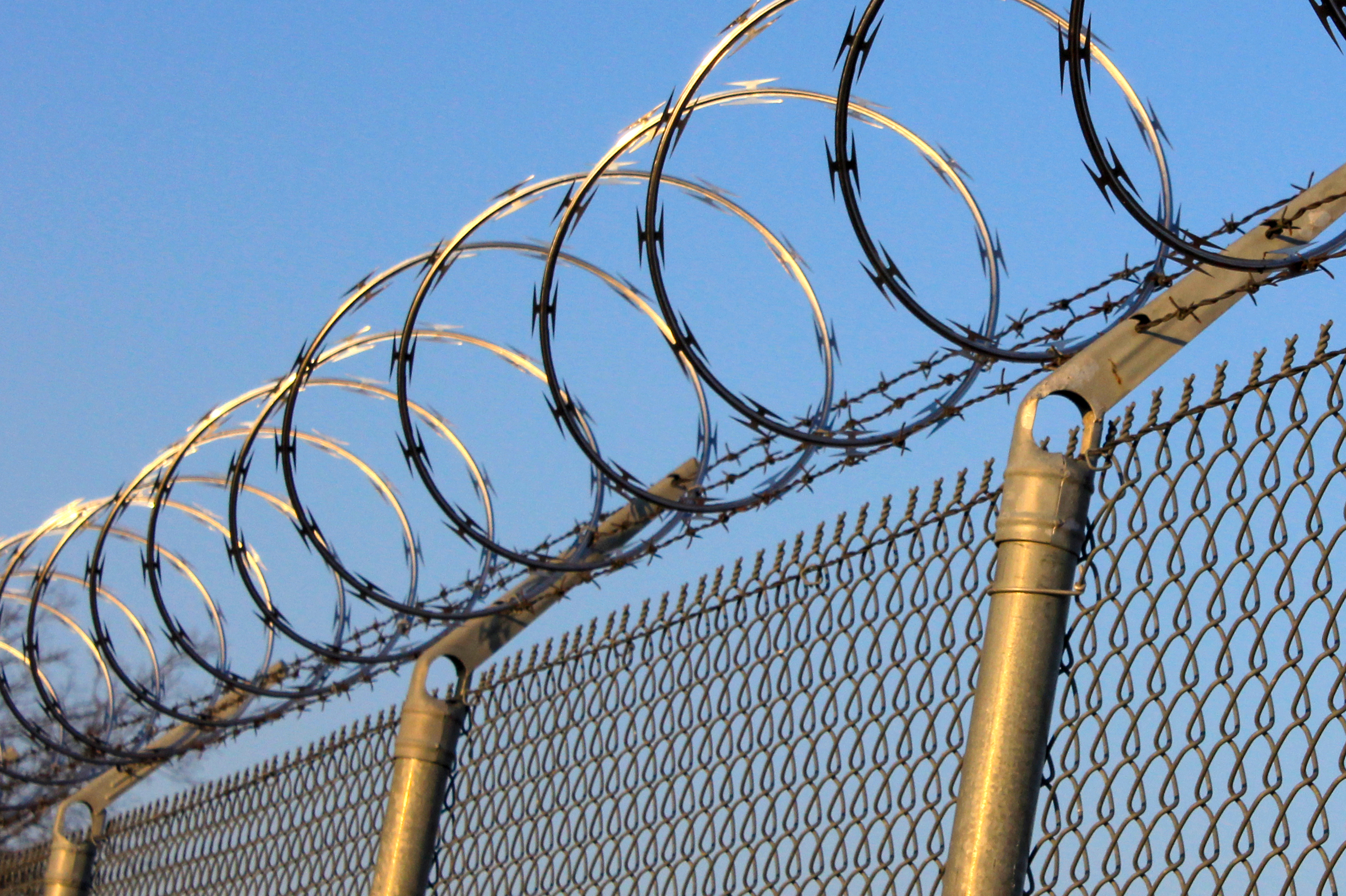 razor wire on fence - silent sentry