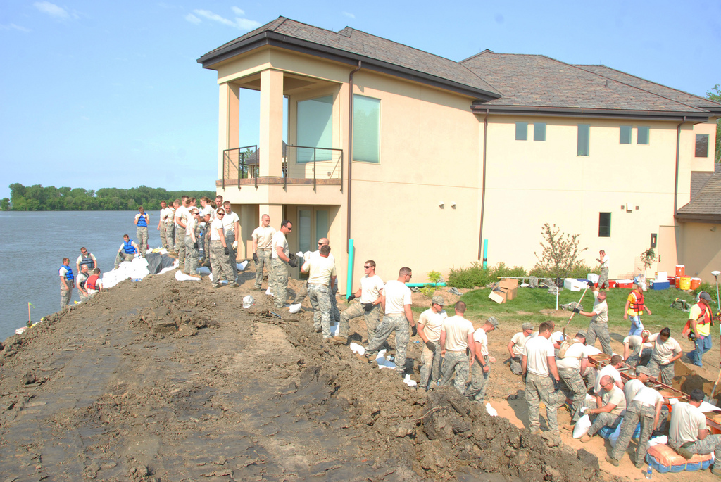 South Dakota National Guard members finish a section of a levee