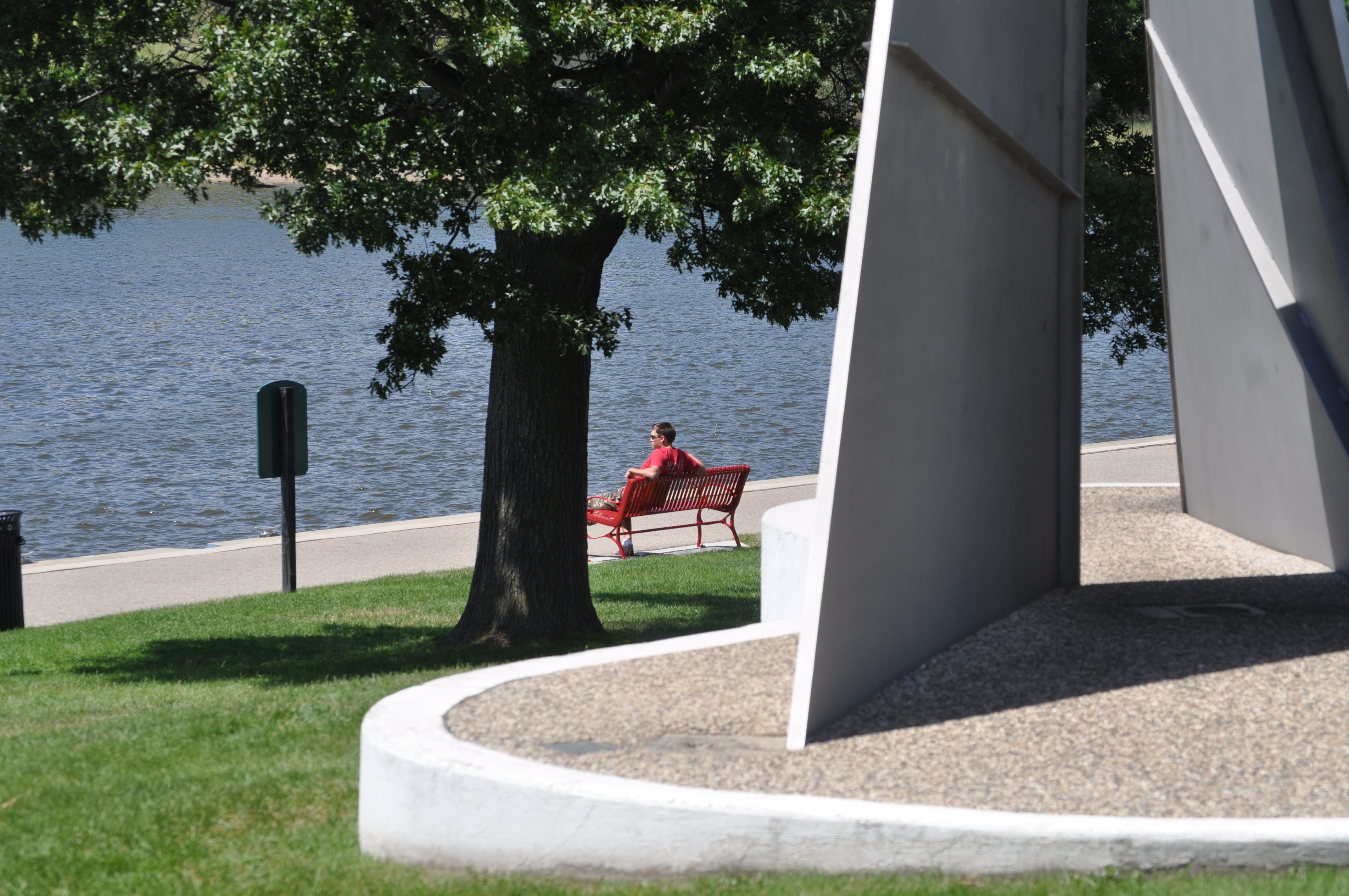 A Man Enjoys the Riverfront in Grand Haven - Public Art and Placemaking