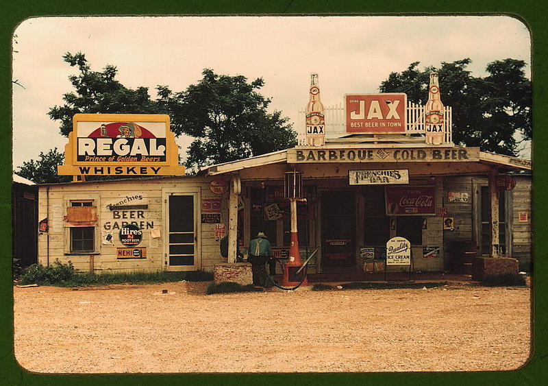 A cross roads store, bar, "juke joint," and gas station in the cotton plantation area, Melrose, La.  (LOC)