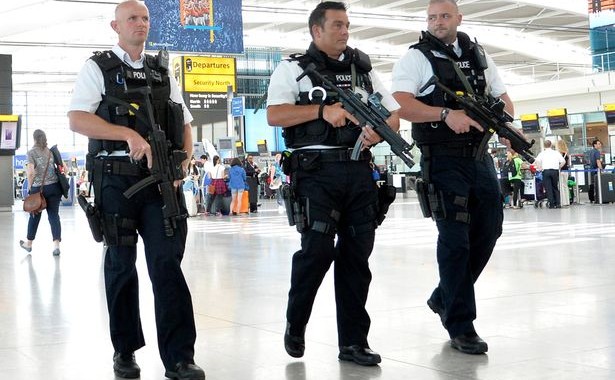 Armed-Police-patrol-Heathrows-Terminal