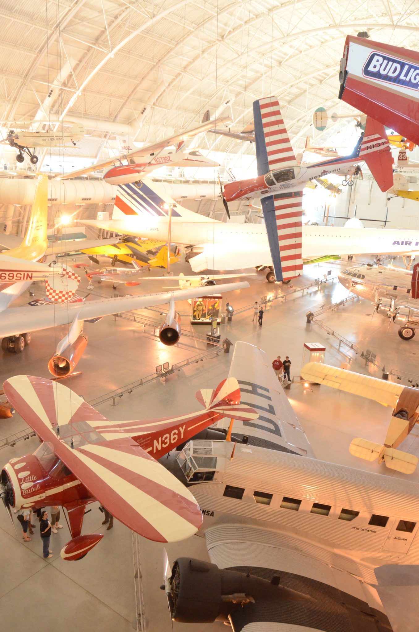 Steven F. Udvar-Hazy Center: South hangar panorama, including stunt planes (DHC-1A Chipmunk, Monocoupe 110 Special, etc) hanging over the Concorde, among others